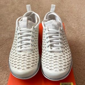 BRAND NEW, NEVER WORN, IN BOX, WHITE/METALLIC SILVER WHITE “NIKE” ATHLETIC SHOES